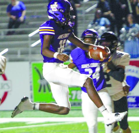 Devin Edmonds, who got the start at quarterback on Friday, sprints into the end zone for a second-quarter touchdown. BRAD HARRISON/Staff