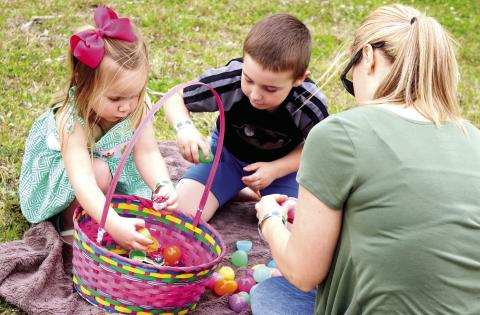 A family enjoys a previous Easter egg hunt in Jones County. FILE PHOTO