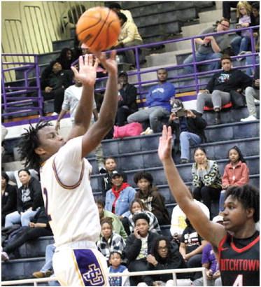 Daethan Harris drains a jump shot in the second half against Dutchtown. BRAD HARRISON/Staff