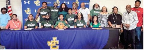Chance Banks poses after signing a letter-of-intent Monday to play basketball at Thomas University, which is located in Thomasville. CONTRIBUTED