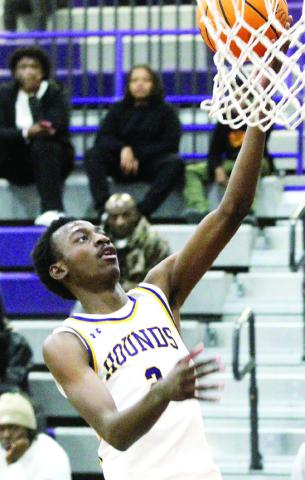 Rudy Bowden glides in for a lay-up against Hampton. BRAD HARRISON/Staff