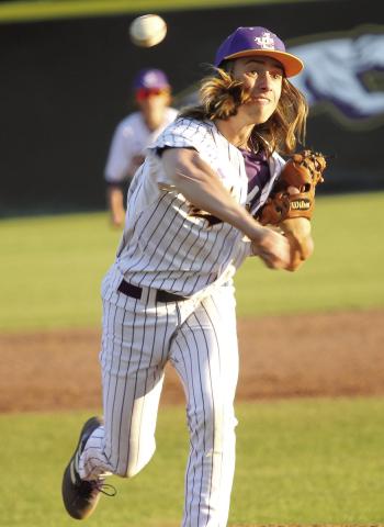 Trent Paulk rips a pitch toward the plate in the second game of Friday’s doubleheader against Bainbridge. BRAD HARRISON/Staff
