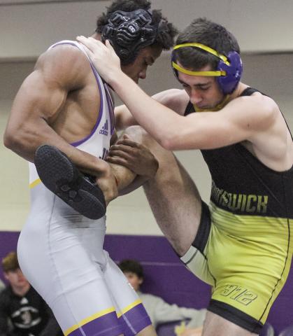 Robert Scott tries to take his opponent from Brunswick down via a leg takedown during Saturday’s Gauntlet In Gray. BRAD HARRISON/Staff