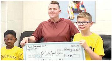 Boys sell lemonade to support local pets