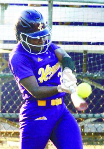 Aniya Canty lines a two-run single into play against Warner Robins. BRAD HARRISON/Staff