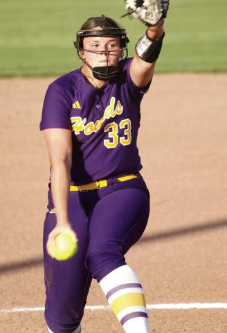 Kaleigh Scarborough rocks back and delivers a pitch during Wednesday’s win against Perry. BRAD HARRISON/Staff
