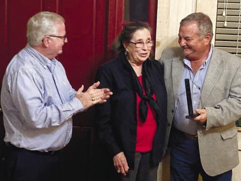 Cecil Ethridge (left) applauds as Earlene Hamilton is announced as the Hamilton/Williams Award winner by Earl Colvin at the Feb. 9 event. CONTRIBUTED