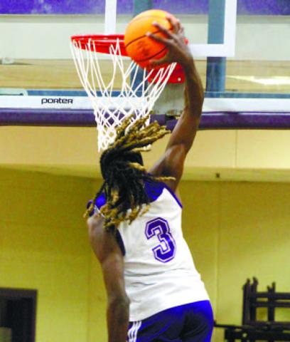 The Greyhounds entertained the crowd during Saturday’s Purple &amp; White Game, slamming home a few dunks. BRAD HARRISON/Staff
