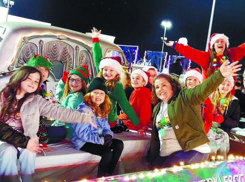 Members of the First Baptist Church Kids Ministry enjoy the annual Gray Jaycees Christmas Parade that took place Dec. 13. The Jaycees have sponsored the parade since 2001. SEE MORE PHOTOS >> PAGE B1 BRANDY ROUND/Contributed