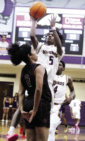 Jaden Stanley (5) goes up and over a Union Grove defender for two points last Thursday. The Greyhounds began the week second in the region and host Ola and Dutchtown next week. SEE FULL COVERAGE IN SPORTS >> B1 BRAD HARRISON/Staff
