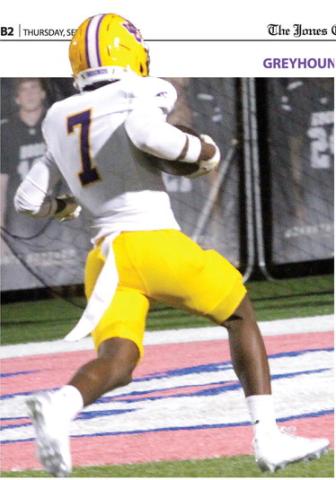 Wayne McCormick glides into the end zone after returning an interception for a touchdown against Houston County. BRAD HARRISON/Staff
