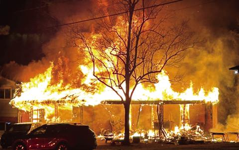 This home on Gateway Court was fully engulfed in flames when firefighters arrived, minutes after the Nov. 28 fire was reported. CONTRIBUTED