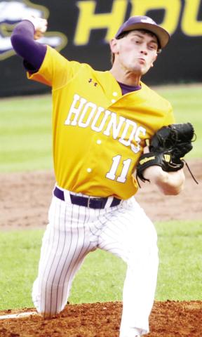 Dalton Lowe delivers a pitch last Wednesday against Locust Grove. BRAD HARRISON/Staff