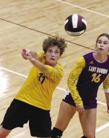 Tori Land gets in position to return a ball over the net against Dutchtown. BRAD HARRISON/Staff