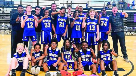 Crowning moment: Gray Station boys win conference title