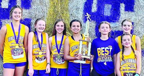 With three _nishes within the top nine, Jones County’s girls won last week’s middle school athletic league championship meet. CONTRIBUTED