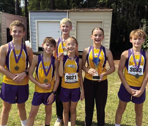 Jones County’s middle school runners pose after bringing home another finish near the front on Saturday in Cochran. CONTRIBUTED