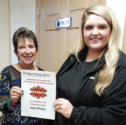 Kayla Whitley (right) receives her $100 gift card for winning the Valentine photo contest on jcnews. com. The winning photo was of her daughter, Magnolia. The card is presented by marketing representative Dianne Phillips. Check jcnews.com for information on future contests. CONTRIBUTED