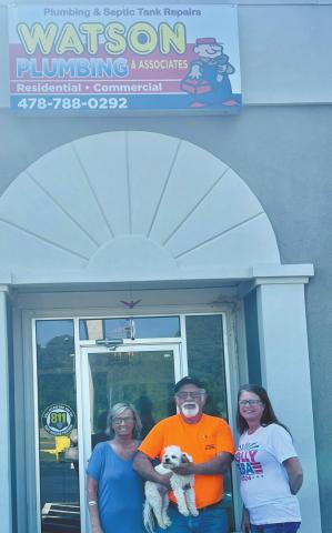 Denise Watson and Johnny Watson with their office manager, Kim Vinson. (Left to right)