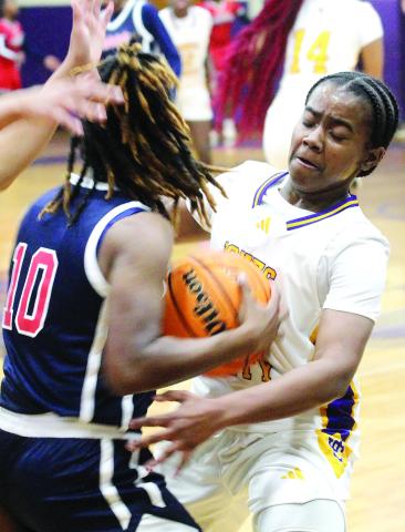 The Lady Hounds smothered the Patriots on Saturday, holding them to single digits until the third quarter. BRAD HARRISON/Staff