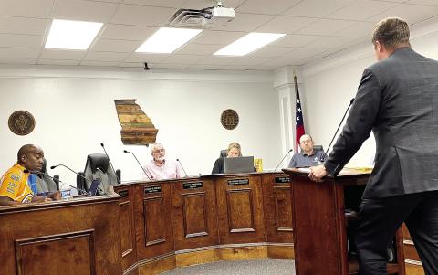Ocmulgee Judicial Circuit District Attorney Wright Barksdale speaks to Jones County Commissioners at their June 18 meeting with budget requests for staff members in the Jones County DA’s office.