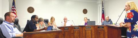 Jones County Library Branch Manager Julie King (far right) speaks with Commissioners at their July 5 meeting. DEBBIE LURIE-SMITH/Staff