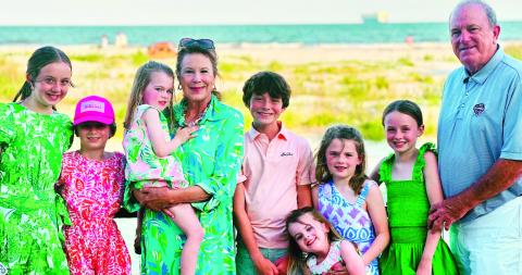 The Greenes with their grandchildren this past summer at the beach. CONTRIBUTED