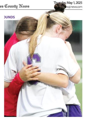 A trio of Lady Greyhounds embrace after last week’s postseason loss. It was the Lady Hounds’ best record in four seasons. BRAD HARRISON/Staff