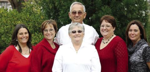 The Coulter family some years ago: (l-r) Tonya Knowles, Terri Robertson, Bobby, Tammy Coulter, Tisha Amerson and Joyce in the front. CONTRIBUTED