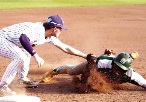 The Greyhounds make the out at third base to end Stockbridge’s at-bat in the first inning. BRAD HARRISON/Staff