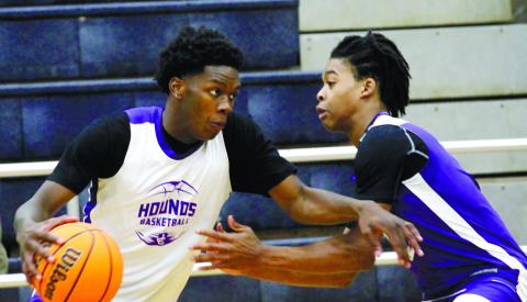 The Greyhounds and Lady Greyhounds scrimmaged with fans in the stands on Thursday, giving them an extra element to prepare for the upcoming season. BRAD HARRISON/Staff