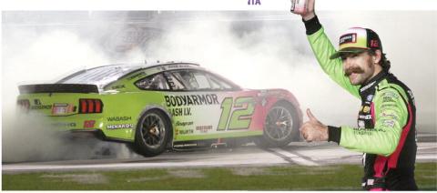 Ryan Blaney touches off an early-morning celebration following his dominant win at Echopark Speedway in Hampton.