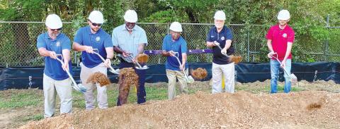 Jason Farmer (l-r), Matt Scroggins, Frank Ross, David Tufts, Ed Barbee and Cheyenne Morgan throw the ceremonial first shovels of dirt at the build site. DEBBIE LURIE-SMITH/Staff