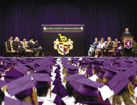 Jones County High School principal Lance Rackley speaks to the Class of 2023 at the graduation ceremony held May 23 at the Centennial Center in Milledgeville.