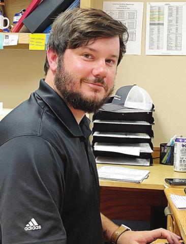 Brandon Stark at his desk at the Jones County Water Department on Highway 49. DEBBIE LURIE-SMITH/Staff