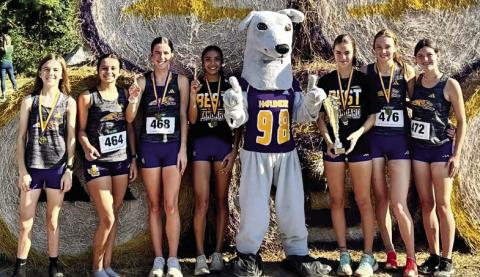 The Lady Greyhounds placed five runners in the top 12 to take first in Saturday’s girls race. CONTRIBUTED