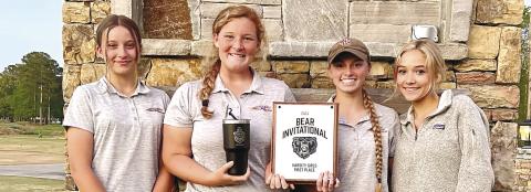 Keegan Goins, second from left, was the low medalist in last week’s Bear Invitational. CONTRIBUTED