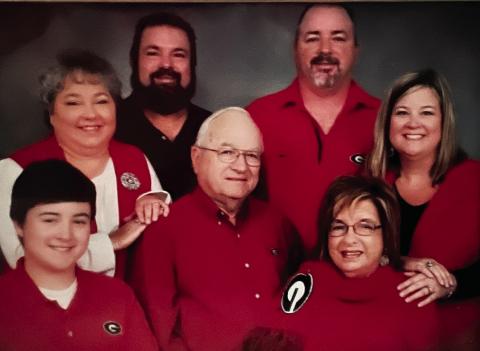 The Crutchfields in 2013 with grandson Chase (front left). Also pictured are (l-r) Wanda, Steve, Jimmy, Howell, Janet and Andrea. CONTRIBUTED