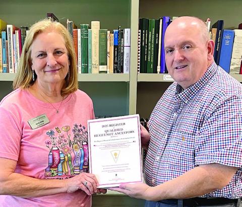 Christopher Stokes visited the Jones County Library recently and presented a copy of the 2025 Register of Qualified Huguenot Ancestors. This will be added to the genealogy area for reference only. CONTRIBUTED