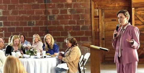 Jessica Walden, president of the Macon Chamber of Commerce, speaks at the March 27 Women in Business Luncheon. DEBBIE LURIE-SMITH/Staff