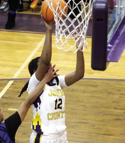 Liberty Pennamon works her way to the basket for two points against the Wildcats. BRAD HARRISON/Staff
