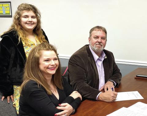 District 1 Commissioner Sam Kitchens was accompanied by his wife and granddaughter as he qualified last Wednesday. DEBBIE LURIE-SMITH/Staff