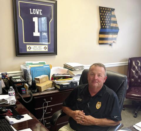 Lowe in his office at the Gray Police Department. CONTRIBUTED
