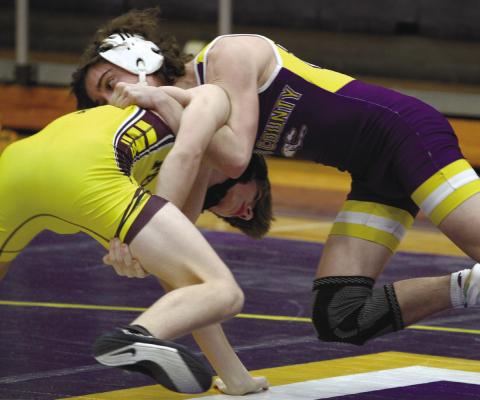 Hunter McCleskey gets the upper hand against his opponent in last week’s match against Perry. BRAD HARRISON/Staff