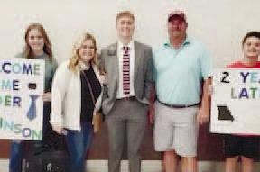 Nicholas Johnson, a young missionary from Jones County who recently returned home, with his family at the airport. CONTRIBUTED