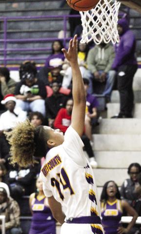 Britley Johnson coasts in for a second-half layup against Warner Robins. BRAD HARRISON/Staff