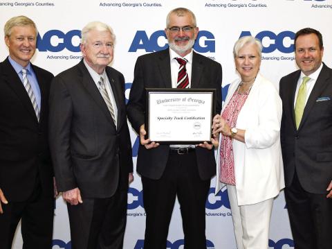 Dave Wills (l-r), Henry Craig, Jones County Commission Chairman Chris Weidner, Mara Shaw, and Rob Gordon. Weidner was honored for completing the Citizen Engagement specialty track of the ACCG Lifelong Learning Academy during the Association’s 2024 Annual Conference in Chatham County. CONTRIBUTED PHOTOS