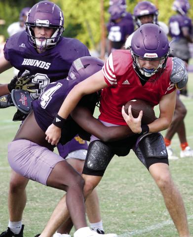 The Greyhounds officially began practice with a morning and early-evening session on Monday. JCHS hosts Mary Persons in a scrimmage next Friday. SEE FULL COVERAGE >> PAGE B2 BRAD HARRISON/Staff