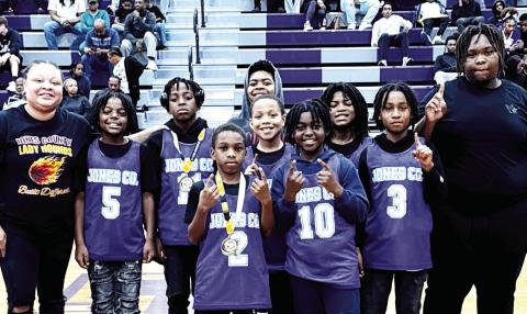 Jones County’s 10U Basketball All Stars pose as they’re recognized during Friday’s high school state tournament game at the JCHS Gymnasium. BRAD HARRISON/Staff