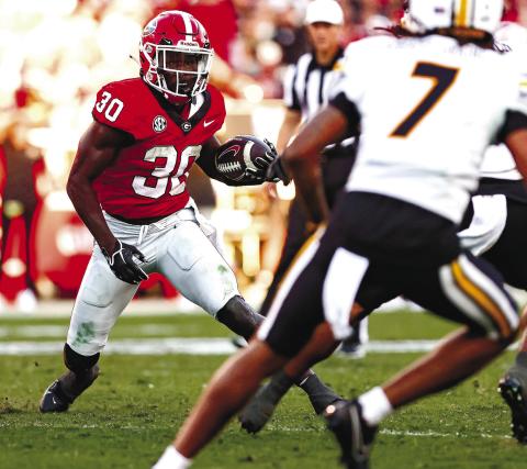 Daijun Edwards (30) rushed for 77 yards on 16 attempts last week in Georgia’s win over Missouri. TONY WALSH/UGA Athletics